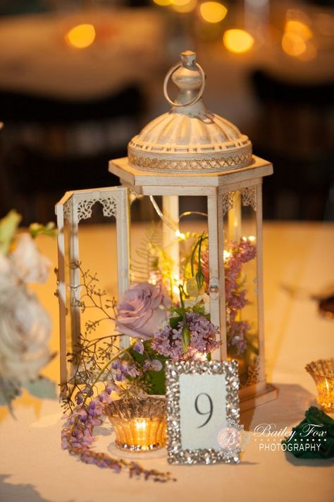 Lanterns are a beautiful idea for Wedding Reception Decoration. These tips & ideas, with some DIY options are gorgeous & elegant to suit every budget Amazing Wedding Centerpieces, Lantern Decor Wedding, Lantern Centerpiece Wedding, Lantern Centerpieces, Lantern Ideas, Rustic Lanterns, Wedding Floral Centerpieces, Wedding Lanterns, Rustic Wedding Centerpieces