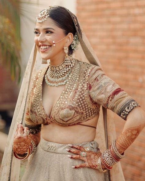 Not everyone can pull off a beige lehenga and rock the look. The bride of the week, Tanvi Singh donned a beige-colored lehenga, designed by Sabyasachi Mukherjee, and looked extremely graceful🤎🤍 Bride: @tanvisiingh28 Outfit: @bridesofsabyasachi @sabyasachiofficial Photography: @fourfoldpictures #sabyasachi #sabyasachibride #bride #bridaloutfit #brideoftheday #brideoftheweek #bridalmakeup #bridalwear #bridemakeup #bride2024 Beige Lehenga, Radhika Merchant, Sabyasachi Mukherjee, Sabyasachi Bride, Lehenga Bridal, Bridal Outfit, Bride Makeup, Dream Dresses, Grand Entrance