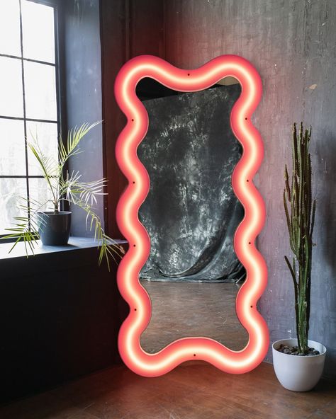 Introducing the new @seletti Super Curve Mirror! Available in four amazing designs ✨ Designed to inject your space with a burst of neon-inspired colours, this mirror is a true statement piece. With an integrated LED strip, it adds a soft, colourful glow, elevating the ambiance and bringing a touch of extravagance to your space. The Super Curve Mirror is all about energy and flair, breathing life into your walls and creating a trendy, artistic atmosphere. 😍😍😍 #seletti #selettiworld #cou... Squiggly Mirror, Tall Mirror, Pop Aesthetic, Light Mirror, Unique Mirrors, Cool Mirrors, Oval Rugs, Outdoor Table Lamps, Room Transformation