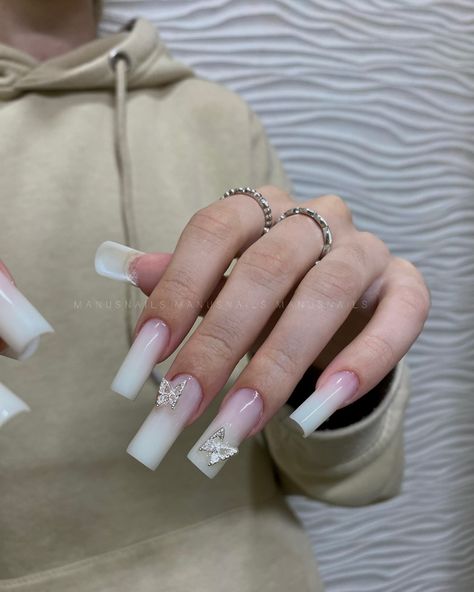 Butterfly charm nails🦋🤍 #butterflycharmnails #butterflynails #charmnails #milkywhitenails Gel X Nails With Charms, Nails Ideas White, Nails Inspiration Butterfly, Butterfly White Nails, White Nails W Charms, Nails White With Butterfly, Charms On Nails, White Nails Charms, Milky White Butterfly Nails