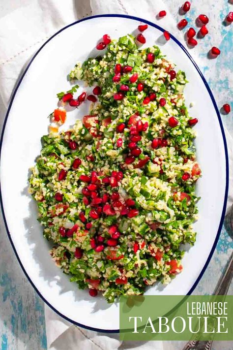 Taboule salad on a white oval plate, scattered with pomegranate seeds. Arabic Salad, Lebanese Salad, Bulgur Wheat, Vegetarian Salad, Tabbouleh Salad, Lebanese Cuisine, Vegetarian Salad Recipes, Pasta Sides, Vegetarian Salads