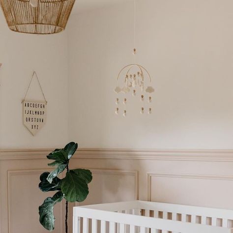 Norfolk at Home on Instagram: "REVEAL✨Little miss Emmy’s nursery! Not fully styled yet as she won’t even move into this room for another 5 months, but I just love it so much so I wanted to share! 🥰  We DIY’d all of the wainscoting in this room and I’m obsessed with it. All of the trim and chair rail came from @homehardware and it was such a satisfying and rewarding project to tackle - check out our reel on how we designed the boxes and sizes! Adding this texture on the walls really brought back some of the charm that was stripped from this old house when it was converted into a B&B.  With your help, we landed on Basking Ridge Beige from @benjaminmoore for the wainscoting and trim, and Simply White for the walls. I wanted the pink to feel like it had always been here - authentic - so this Chair Rail And Wallpaper Nursery, Nursery With Chair Rail, Chair Rail Molding Nursery, Wainscoting Nursery Girl, Wayne Scotting Walls Nursery, Chair Rail Nursery, Chair Rail Bedroom, Pink Wainscoting, Nursery Wainscoting