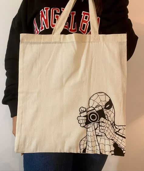 Tote Bag Design Ideas, Bag Design Ideas, Spider Man Peter Parker, Handpainted Tote, Diy Tote Bag Design, Mens Designer Bag, Anime Tote Bag, Handpainted Tote Bags, Totes Ideas