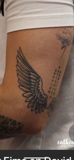 Angle Wings Tattoo Men, Wing Elbow Tattoo, Wings Tricep Tattoo, Small Elbow Tattoo Men, Angel Wings Tattoo Men, Tricep Tattoo Men Simple, Angel Wings Tattoo For Men, Angel Wings Tattoo On Arm, Wing Tattoo Men Arm