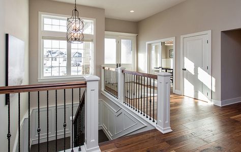 Dynasty Partners Homes custom built/designed light-filled entry way. #desmoines #design #interior #customhome #home Switchback Stairs, Stairs To Basement, Basement Stairway, Entryway Designs, Foyer With Stairs, Theater Rooms, Designer Kitchens, Basement Layout, Front Entryway