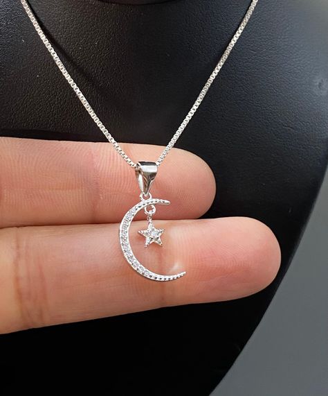 "Sterling Silver Small Moon and Star Charm Necklace Minimalist and Dainty Crescent Moon Necklace Metal: All components are made from solid .925 Sterling Silver Measurement: pendant height is 21mm (0.83 inches) including bail and 11mm (0.43\") wide Choose Chain Length At Checkout You can find other charm jewelry in my shop here https://www.etsy.com/shop/LinksAndStones?ref=seller-platform-mcnav&section_id=24389019 Please feel free to Convo me with any questions before purchasing. Please view p Moon Silver Necklace, Moon Star Necklace, Moon And Star Necklace, Crescent Moon Necklace Silver, November Birthstone Necklace, Moon Necklace Silver, Star And Moon Necklace, Pretty Jewelry Necklaces, Space Jewelry