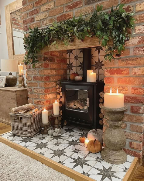 Farmhouse brick style fireplace Christmas Inglenook Fireplace, Christmas Log Burner Fireplace, Log Burner Christmas Decorations, Decorative Logs In Fireplace, Cozy Cottage Style Living Room, Fireplace Logs Decorative, Red Brick Fireplace Living Room, Cottage Fireplaces, Wood Burner Fireplace Ideas