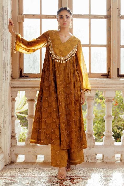 Olive green bandhani printed A-line kurta with pleated and embroidered yoke. Paired with coordinating pant. - Aza Fashions Aza Fashion Kurti, A Line Suit Designs, Aza Fashion Outfits 2024 Suits, Kurta Designs For Wedding, Bandhani Suits Design, Printed Kurta Designs Women, Drees Desgin Latest, Kurti Styling Ideas, Kurti Designs Cotton