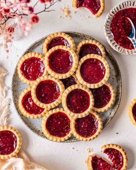 Vegan Jam Tarts via @rainbownourish Jam Tartlets, Rainbow Nourishments, Vegan Jam, Homemade Raspberry Jam, Jam Tarts, Dubai Food, Raspberry Tarts, Buttery Cookies, Shortcrust Pastry