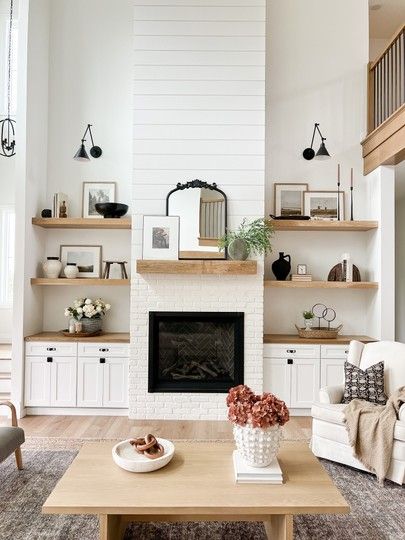 Shop our built ins Affordable finds, look for less, budget friendly, shelf decor, fireplace decor, coffee table decor, vase, vessel, pot, bowl, wall sconces, bookends #LTKunder100 #LTKhome #LTKsalealert Shelves Around Fireplace, Built In Around Fireplace, Fireplace Bookshelves, Built In Shelves Living Room, Shelf Decor Living Room, Living Room Built Ins, Fireplace Shelves, Fireplace Built Ins, White Fireplace