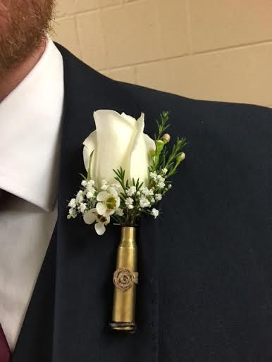 Western Boutonniere Rustic, Jameson Wedding Ideas, Tactical Wedding Ideas, Country Wedding Boutonniere, Mechanic Boutonniere, Country Style Wedding Bouquets, Shell Casing Boutonniere, Shotgun Boutineers, Cowboy Boutonniere