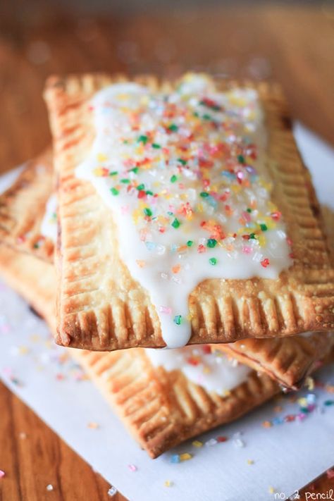 These Homemade Lemon Toaster Pastries are easy to make and really delicious. I used store-bought lemon curd and pre-made pie dough to whip these up in just a few minutes.   Start by trimming the pie dough into a square, then divide both pie doughs into a total of eight rectangles. You will...Read More Homemade Pop Tarts Recipe, Homemade Pop Tarts, Poptart Recipe, Toaster Pastry, Pop Tart, Hand Pies, Lemon Desserts, Tart Recipes, Breakfast Foods