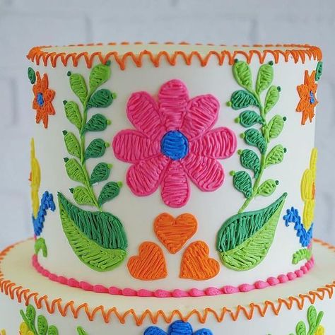 Leslie Vigil on Instagram: "Bright + Bold Embroidery in Buttercream 🧡🌷🌿🌼 Take those outdated notions of what your wedding cake “should” look like... and throw them in the trash. Do. What. You. WANT." Mexican Style Cake Ideas, Mexican Embroidery Cake, Mexican Birthday Cake, Fiesta Theme Cake, Mexican Themed Cakes, Mexican Fiesta Cake, Three Esta, Otomi Art, Mexico Party