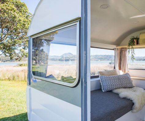 This sweet little caravan has been given the most stylish makeover Caravan Window Ideas, Tiny Caravan Interior, Caravan Exterior Ideas, Renovate Caravan, Husvagn Makeover, Upcycled Caravan, Tiny Caravan, Caravan Exterior, Caravan Interior Makeover