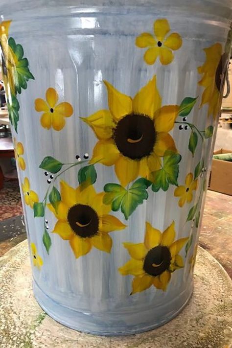 20 Gallon Lighgt Blue wash with sunflowers and greenery Measurements: 24" tall x 17" diameter INDOOR/OUTDOOR Hand Painted Trash Can - Hand Painted Garbage Can Painted Buckets, Painted Trash Cans, Fall Flower Pots, Painted Mailboxes, Fall Wood Crafts, Filler Flowers, Painted Terra Cotta Pots, Painted Flower Pots, Painting Plastic