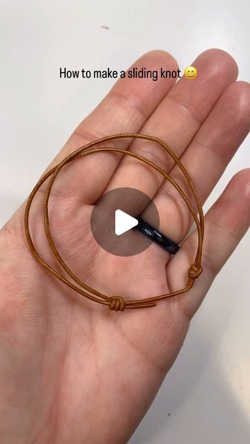 Andria Bieber Designs on Instagram: "How to make a sliding ( barrel) knot with 1.5 mm leather cording from @beadalon  for bracelets or necklace leather jewelry   ( my cat Luna wanted to help 😂)  Directions:  Cut 18 inches of 1.5 mm cord ( so you have enough to work with for tying knots)  *Take the left strand of the cord and have it lay in front of the right strand of the cord. *Wrap the cord forming a loop around the right strand of the cord once and once again. Then take it back over to the left strand. Then feed it through the two loops you’ve just made it going from left to right.  *Pull tight. The knot will slide on the cord. *Now you want to do this again on the other side. *Take the end of the right hand strand, and make sure it’s in front of the left strand. Wrap it once  to form Leather Cord Bracelets Tutorial, How To Tie A Bracelet Sliding Knot, Suede Cord Bracelet Diy, How To Do Bracelets, Barrel Knot, Cord Bracelet Diy, Crafts 2024, Sliding Knot Bracelet, Leather Cord Jewelry