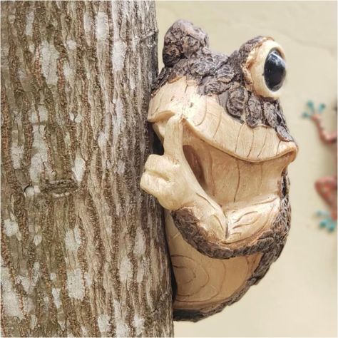 PRICES MAY VARY. 🐸【Garden Peeper Frog】Add a touch of humor to your yard with this charming frog tree peeker sculpture. Surprise your family and friends with an unexpected character peeping out from your backyard tree. The whimsical design is sure to bring a smile to your face and those around you. 🐸【High Quality】Crafted from durable resin and hand-painted with exquisite colors, this frog sculpture is built to last and suitable for both indoor and outdoor use. This makes it an ideal gift for an Yard Sculptures, Outdoor Trees, Tree Faces, Frog Figurines, Outdoor Living Decor, Tree Sculpture, Rustic Outdoor, Outdoor Statues, Decor Figurines