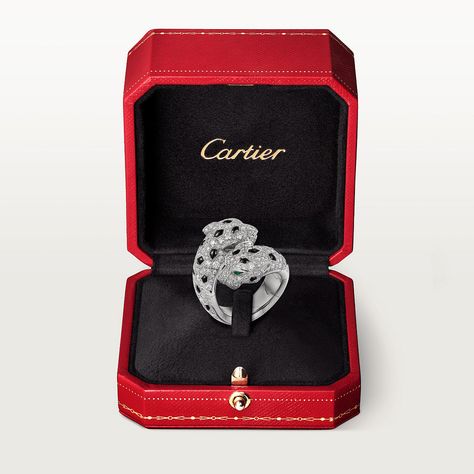 Panthère de Cartier ring, white gold 750/1000, onyx, set with 4 emeralds and 298 brilliant-cut diamonds totalling 1.82 carats (for size 52). Cartier Rings Stacked, Cartier Panthere Ring, Cartier Panther Ring, Panthere Cartier, Cartier Diamond Ring, Cartier Diamond Rings, Cartier Panther, Jewelry Cartier, Cartier Diamond