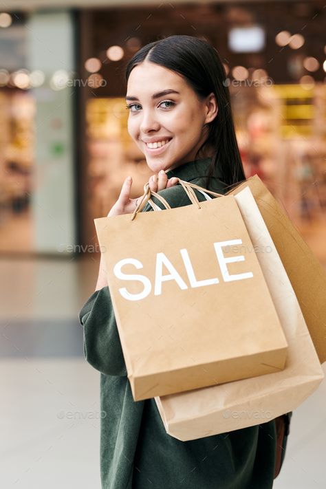 Young cheerful shopper carrying bunch of paperbags while moving along mall by Pressmaster. Young cheerful shopper carrying bunch of paperbags while moving along large contemporary trade center and looking bac... #Sponsored #bunch, #paperbags, #moving, #carrying Move Along, Trade Centre, Corporate Brochure, Versailles, Looking Back, Carry On, Social Media Marketing, Social Media, Marketing