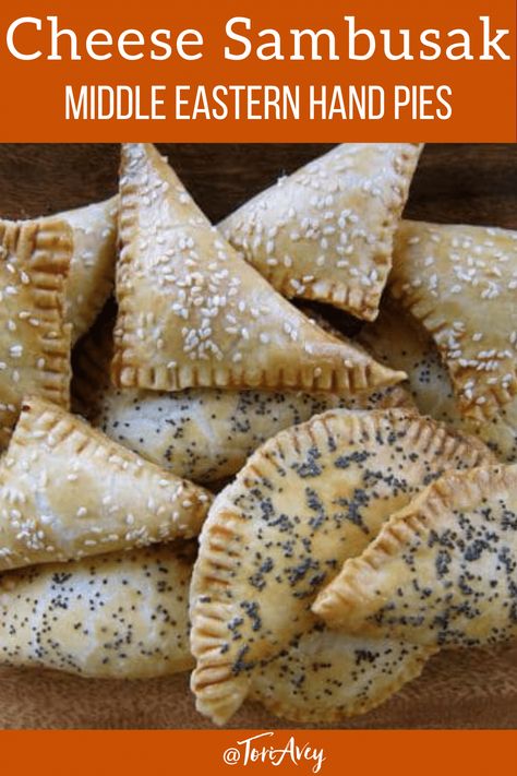 Cheese Sambusak - Savory Middle Eastern turnover pastry hand-pies stuffed with cheese and fresh herbs. A great kosher snack, lunch or dinner! | ToriAvey.com #middleeasternfood #handpies #savorypie #turnover #cheesepastry #savory #purim #TorisKitchen Sambusak Cheese, Cheese Sambousek, Samosa Recipes, Shavuot Recipes, Jewish Deli, Snack Lunch, Lentil Stew, Fritter Recipes, Empanadas Recipe