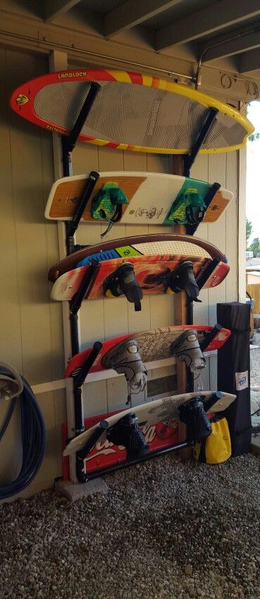 Wakeboard rack Waterski Storage, Lakehouse Storage, Surf Board Rack, Wakeboard Storage, Paddle Board Storage, Wakeboard Rack, Garage Racking, Garage Storage Inspiration, Wakeboard Boats