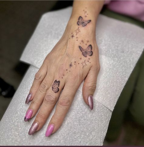 Butterfly Hand Tattoo With Sparkles, Whimsical Hand Tattoo, Fairy Hand Tattoo, Hand Tattoo Girl, Flowers Hand Tattoo, Cover Up Hand Tattoos, Butterfly Hand Tattoo For Women, Hand Rose Tattoo, Fingers Tattoos