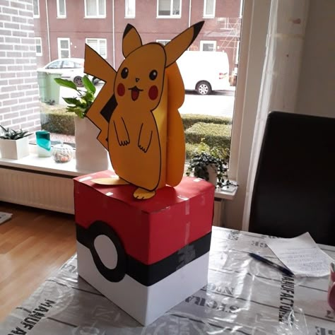 Charizard Valentines Boxes, Charizard Valentine Box Ideas, Pikachu Valentine Box Ideas, Charmander Valentines Boxes, Pokeball Valentine Box Ideas, Pokemon Suprise, Pokemon Gift Basket, Pikachu Valentines Boxes, Pokemon Valentine Box Ideas