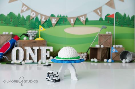 Hole In One Birthday Photoshoot, First Birthday Golf Theme Photos, Hole In One Smash Cake Photos, Hole In One First Birthday Smash Cakes, Hole In One First Birthday Pictures, Hole In One First Birthday Cake Smash, Hole In One Cake Smash, Hole In One Photo Shoot, One Year Old Indoor Photoshoot