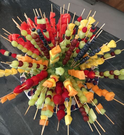 Great way to display fruit kebabs for our fourth of July party! Use half a hollowed out watermelon as a base. Fruit Platters, Fruit Kebabs, Fruit Platter Designs, Fourth Of July Party, Fruit Displays, Cut Watermelon, Charcuterie Inspiration, Watermelon Slices, Fruit Platter