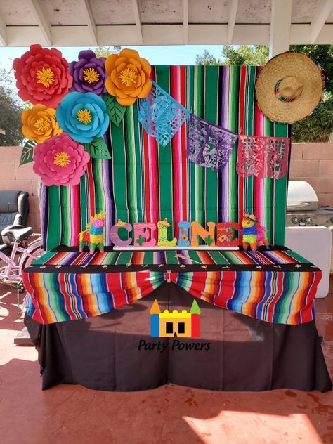 Zarape Backdrop with Paper Flowers, papel picado, and sombrero. Main table with black linen and 2 zarape runners. Great for fiesta theme party and mexican theme party. Paper Flowers Mexican Fiesta Party, Mexican Main Table Decorations, Mexican Paper Flowers Backdrop, Ideas For Mexican Theme Party, Mexican Birthday Backdrop, Main Table Quinceanera Mexican Theme, Fiesta Theme Backdrop Ideas, Papel Picado Backdrop, Mexican Backdrop Ideas