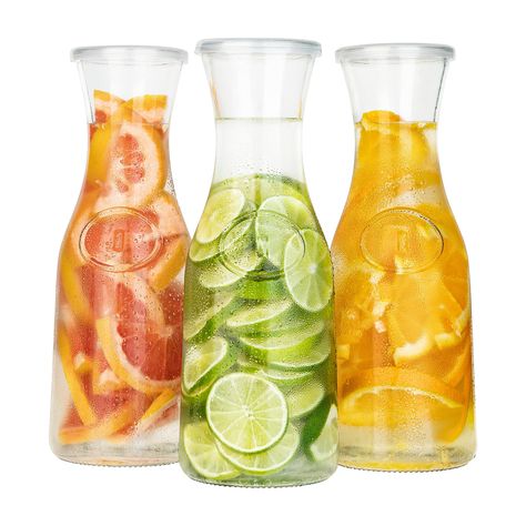 PRICES MAY VARY. ✔️ Kook Glass Carafe Pitchers, Beverage Dispensers, Clear Jugs For Mimosas, Water, Wine, Milk and Juice, with Plastic Lids, Dishwasher Safe, 50 oz, Set of 3 ✔️ Wine, juice and more! Add a touch of class to your kitchen table or home bar. These jugs are perfect for serving wines, juices, water milk and everything in between. ✔️ Durable Glass : Made from durable, high-quality glass with a narrow neck and elegant hourglass silhouette. Each carafe has a 50 ounce capacity. ✔️ Lids In Juice Glass Set, Wishlist Board, Carafe Set, Pouring Wine, The Kooks, Water Carafe, Brunch Table, Juice Glass, Womens Conference