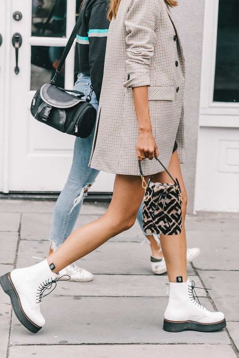 White Dr. Martens Street Style Rihanna Street Style, White Dr Martens, White Doc Martens, Gigi Hadid Street Style, White Combat Boots, Ultimate Capsule Wardrobe, Dr Martens Outfit, European Street Style, Converse Outfits