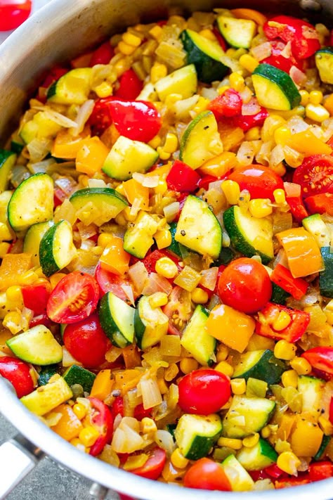 Skillet Zucchini, Corn, and Peppers (Calabacitas) - An EASY Mexican-inspired recipe ready in 15 minutes with zucchini, corn, bell peppers, tomatoes, and green chiles!! HEALTHY, vegan, and naturally gluten-free! When there's an abundance of summer produce, this recipe is PERFECT!! Skillet Zucchini, Calabacitas Recipe, Zucchini Tots, Zucchini Corn, Averie Cooks, Bell Pepper Recipes, Summer Produce, Green Chiles, Parmesan Zucchini