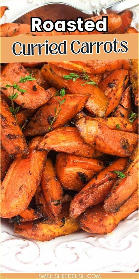 Roasted curried carrots are a vibrant and flavorful side dish that's  surprisingly simple to make. This recipe transforms humble carrots into a  delightful accompaniment to various mains, thanks to the warm embrace  of aromatic curry spices and a touch of sweetness from honey. Curried Carrots, Curry Carrots, Frozen Casserole Recipes, Pork Tenderloin Medallions, Carrots Side Dish, Vegetable Bread, Carrots Recipe, Sides Recipes, Flavorful Vegetables