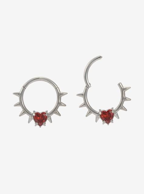 Silver-tone set featuring 2 hinged clickers with spike detailing and red heart gem accents.Jewelry care: Wash with antibacterial soap and warm water.Piercing care: Wash hands thoroughly  then clean piercing with H2Ocean (sold separately) or saline solution.316L surgical steel- may contain some nickel16G4mm gem stoneSet of 2Use in healed piercings only. Remove immediately if irritation occurs. Do not use harsh or alcohol-based chemicals to clean jewelry. This may cause tarnishing.Intend Punk Septum Piercing, Pretty Septum Piercing Jewelry, Mouth Piercings Lips, Star Septum Piercing, Cool Septum Jewelry, Cute Septum Piercing, Silver Septum Piercing, Pierced Clothing, Emo Piercings