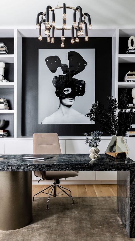 The consistent monochromatic color scheme flows seamlessly across various spaces, enhancing the overall chic ambiance. The flex space was transformed into a bespoke office featuring custom built-ins framing a rare Twiggy art piece. The central desk, crafted from serpentine granite, is complemented by an expansive wall mirror that visually expands the room. Custom Built Ins, Monochromatic Color Scheme, Modern Office, Crescent, Built Ins, Mirror Wall, Color Schemes, Art Pieces, Interior Design