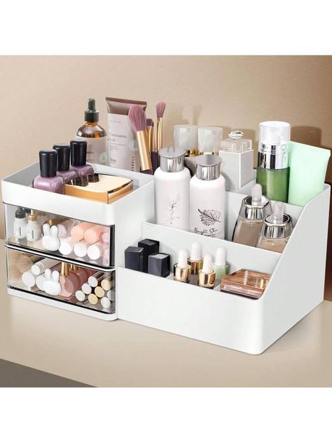 Product Description 1. HIGH QUALITY - The makeup organizer is made of plastic material, compact and simple design, does not deform, and is shiny. It is very suitable to be placed on the bedroom dressing table, bathroom sink and office desktop. 2. PERFECT SIZE - 11.2''L x 6.7"W x 4.7"H.The vanity organizer has 8 compartments and two small clear drawers that can be drawn smoothly. Keep your small items clean and tidy to prevent dust. 3. CLASSIFIED STORAGE - The design of multiple compartments and drawers makes it a perfect cosmetic storage box for storing lotion, essence, facial cleanser, lipsticks, makeup palettes, eye shadows, concealers, makeup brushes and other skin care products, cosmetics, and toiletries. 4. EXCELLENT CHOICE AS GIFT - Perfect choice as a gift to girlfriend, daughter, w Makeup Desk Ideas Organizations, Makeup Storage For Bathroom, Bathroom Makeup Organization, Shelves For Makeup, Organizing Vanity, Makeup Organizer Ideas, Makeup Holder Organizers, Skin Care Organizer, Bathroom Makeup Storage