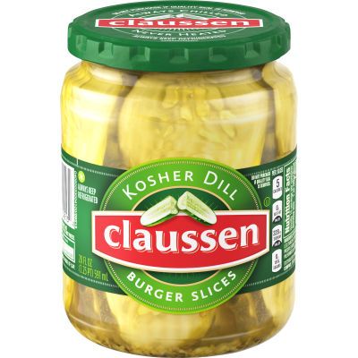 Claussen Kosher Dill Pickle Burger Slices are always chilled and never heated to deliver its signature taste and bite that is always crisp. Claussen is the leading refrigerated pickle brand for good reason - its freshness and bold crunch elevate any meal. Even our brine is flavored with spices like turmeric, garlic, and red pepper, for a difference that you can not only see but also taste. Enhance any burger, sandwich, or entree with the crunch of a Claussen pickle or enjoy by itself at only 5 c Claussen Pickles, Pickle Brands, Pickle Chips, Pickle Slices, Deli Style, Pickle Butter, Steak And Seafood, Tzatziki Sauce, Food To Go