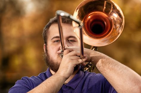 24 creative senior pictures with musical instruments 12 Senior Pictures Band, Senior Band Picture Ideas, Instrument Senior Pictures, Music Senior Pictures, Senior Pictures For Guys Outdoor, Band Senior Pictures Trumpets, Senior Picture Ideas Band Trumpets, Senior Pics With Instruments, Band Senior Pictures Trombone