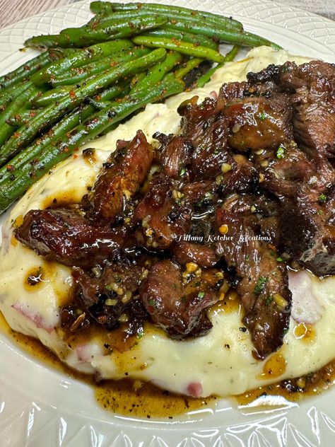 Tiffany Ketcher Kreations, Tiffany Ketcher Recipes, Garlic Butter Steak Bites Over Creamy Aged White Cheddar Mash, Butter Garlic Steak Bites, Creamy Garlic Butter Steak Bites, Garlic Butter Steak Bites With Mashed Potatoes, Garlic Butter Steak Bites Food And Wine, Butter Steak Bites Recipe, Steak Bites With Garlic Butter