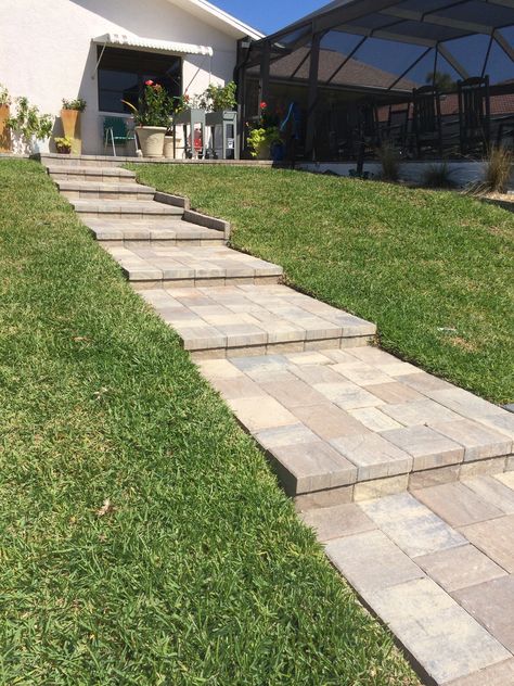 Walkway steep hill to canal Paver Walkway With Steps, Paver Stairs On Hill, Front Porch Pillars, Bluestone Walkway, Porch Pillars, Front Yard Flowers, Wooden Walkways, Paver Walkway, Front Walkway