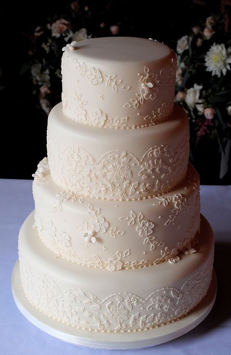 4 tier ivory wedding cake with hand piped lace motif and hand made sugar bees by www.tortebella.co.uk Lace Cake, Wedding Cake Piping, Ivory Wedding Cake, Cake Piping, Lace Wedding Cake, Bee Creative, Cake Lace, Beautiful Wedding Cakes, Ivory Lace