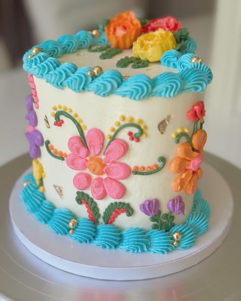 Attempted to recreate this Mexican Fiesta design by @crispycritterbakes it was so fun to make and I loveddd the results 🪅🥳 This was also my first time making buttercream flowers and they’re not as easy as I thought 😮‍💨 - #pipingtips #buttercreamcake #buttercreamdecorating #buttercreamcakes #cakedesign #cakedecorating #tampavintagecake #cakedecorator #buttercreampiping #vintagecake #pink #pinkcake #cakebusiness #pinkvintagecake #pinkheartcake #tampabakery #tampacakes #mexicanfiestacake #fiest... Embroidered Cake, Fiesta Sheet Cake, Mexican Decorated Cake, Mexican Cakes For 15, Mexican Cakes, Mexican Cake With Pink Frosting, Mexican Style Cake Decor, Mexican Fiesta Cake, Floral Mexican Cake