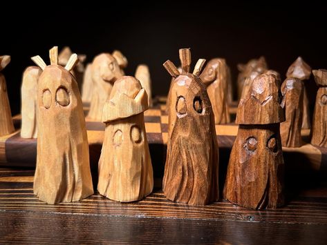 Chess set #2 complete. The light pieces are basswood and the dark are butternut. No sanding or painting, so you’ll see all the grains, knots, worm holes, flaws, imperfections and all. . . . #whittling #woodcarving #woodcraft #ghostcollector #halloween #halloweendecor #chess #chessset Whittled Chess Pieces, Whittling Chess Pieces, Carving Chess Pieces, Wood Ghost, Wood Whittling, Wooden People, Wood Carving Ideas, Wooden Chess, Carving Ideas