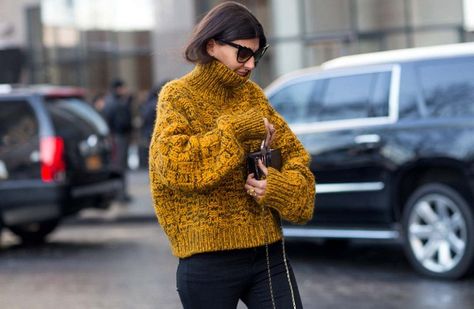 The Latest Street Style Photos From New York Fashion Week | WhoWhatWear.com Orange Sweater Street Style, Yellow Sweater Street Style, Orange Knitwear, Yellow Knitwear, Cozy Yellow Knit Sweater, Street Style New York, Giovanna Battaglia, Autumn Wardrobe, Oversize Knit