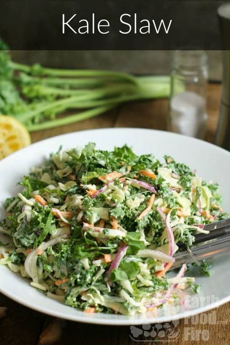 A crunchy and flavor packed kale slaw recipe, dressed with a creamy lemon and garlic dressing. Perfect as a side dish to BBQ meats, fried chicken, or lobster! #kaleslaw #kale #bbq #sidedishes via @earthfoodandfire Kale Slaw Recipe, Lemon Garlic Dressing, Bbq Meats, Kale Slaw, Garlic Dressing, Slaw Dressing, Vegan Coleslaw, Slaw Recipe, Creamy Dressing