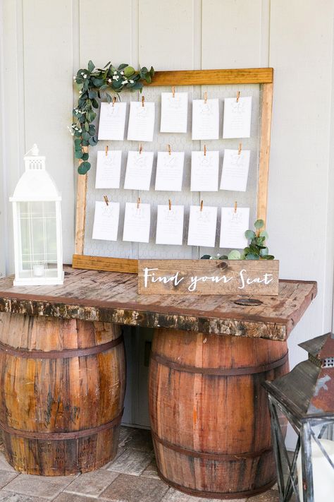 She's getting hitched in a barn, so why not shower her in one? Keep her party on the refined side of rustic with distressed signage, simple florals, lantern décor, and a DIY chicken wire seating chart. Wedding Seating Chart Display, Wine Barrel Wedding, Display Photography, Barrel Wedding, Rustic Wedding Seating, Find Your Seat, Easy Wedding Planning, Card Table Wedding, Wine Barrels