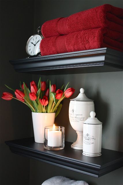 The Yellow Cape Cod Powder Room I absolutely LOVE the color scheme in this room!  The dark gray with white & red are beautiful & the red could easily be changed to other colors.  Now where to use it, hmm..... Red Bathroom Decor, Shelves Above Toilet, Powder Room Makeover, White Bathroom Decor, Bathroom Red, Lodge Decor, Bathroom Redo, White Bathroom, Bathroom Makeover