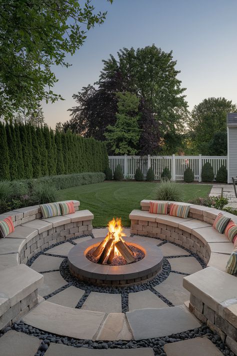 🔥 Follow the link for more inspiring backyard fire pit ideas! 🔥 Transform your yard with a cozy sunken fire pit surrounded by built-in seating. Perfect for a relaxing evening or gathering with friends! 🌿✨ Bring your dream Fire Pit Area to life with lush landscaping and Outdoor Fire Pit Designs that wow. #FirePitLandscaping #FirePitIdeas #DIYFirePit #OutdoorFirePit Stone Bench Fire Pit, Fire Pit Outdoor Area, Garden Ideas Fire Pit, Sunken In Fire Pit, Sunken Fire Pits With Seating, Yard Seating Area Ideas, Brick Firepits Backyard Diy, Hot Tub And Fire Pit Patio, Outdoor Fire Pit Areas