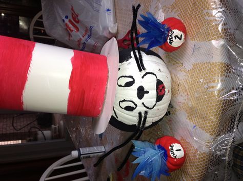 Cute cat in the hat and thing 1&2 pumpkins ! Great idea for Halloween :) Cat And The Hat Pumpkin, Cat In The Hat Pumpkin Ideas, Lorax Pumpkin, Cat In The Hat Pumpkin, Halloween Painted Pumpkin, Literary Pumpkins, Halloween Carnival Ideas, Trunk Or Treat Themes, Paint Pumpkins Kids